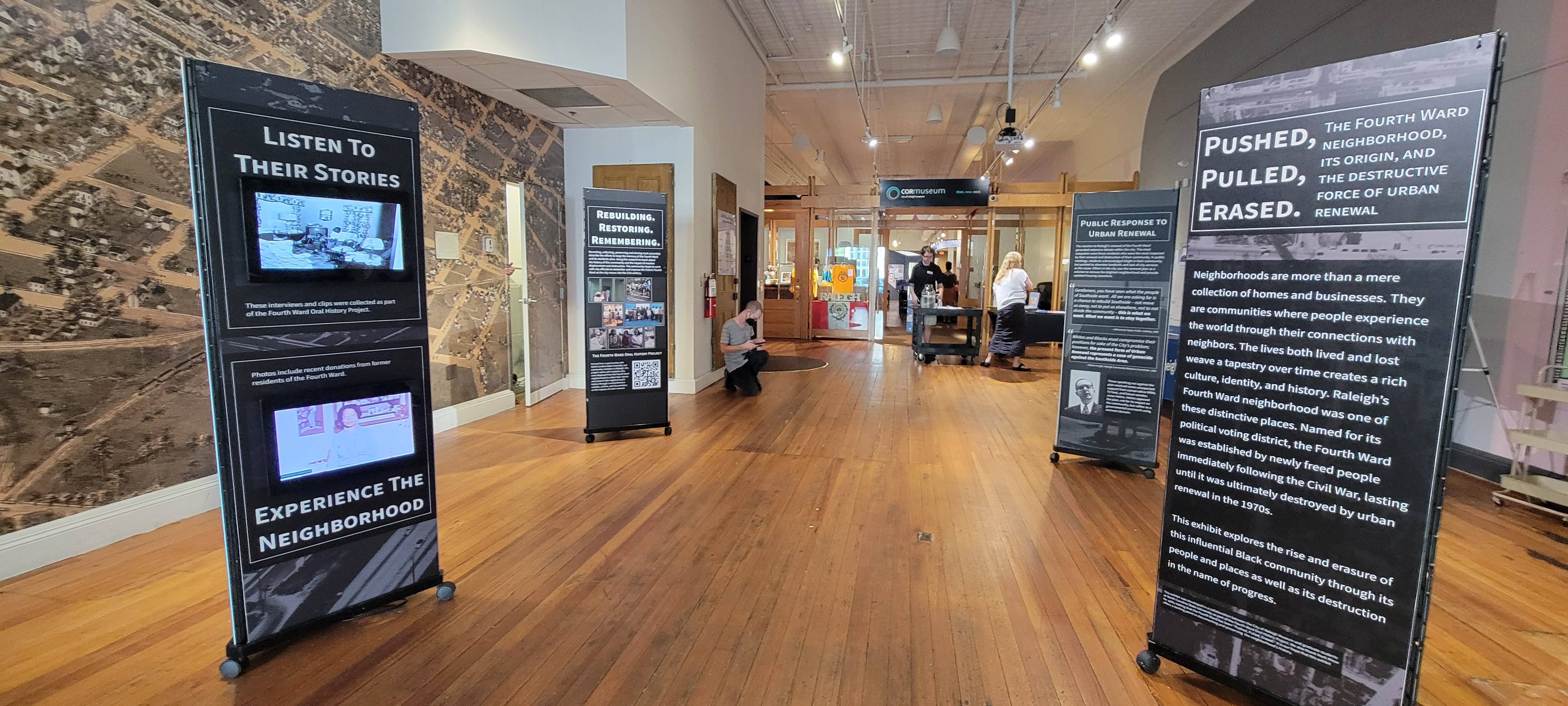 Panels for the Fourth Ward museum exhibit are pictured inside of the lobby for the City of Raleigh museum